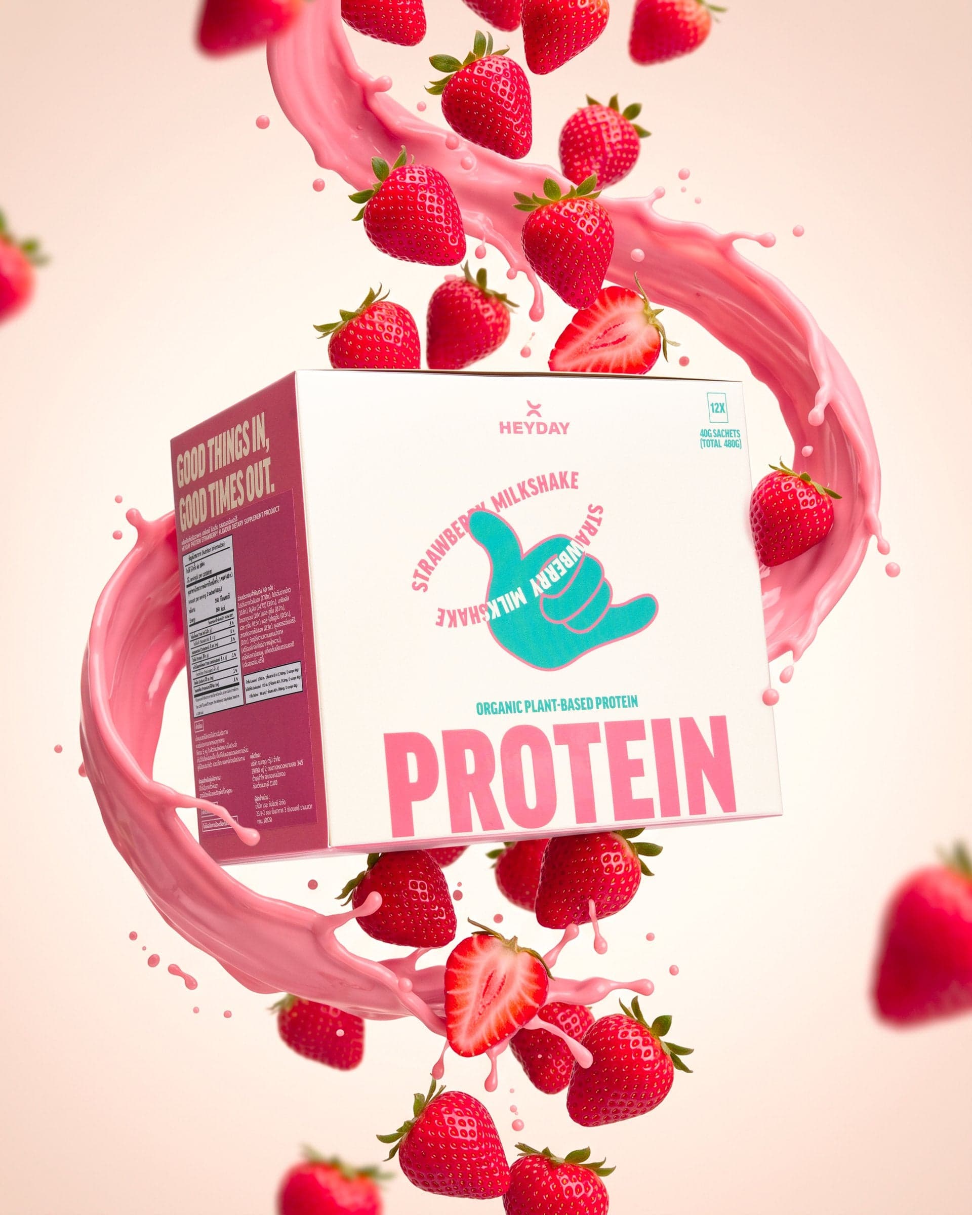 Heyday Strawberry Milkshake protein box with fresh strawberries and a milk splash